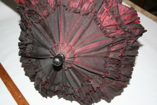 Red parasol owned by Marian Case
